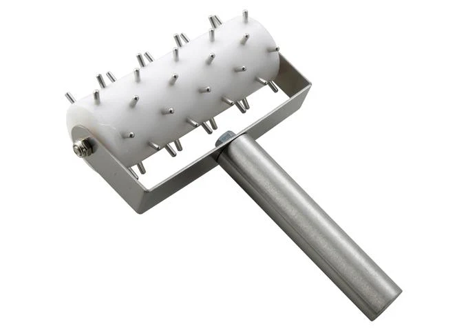 Winco Stainless Steel Dough Roller Docker - 5" Wide